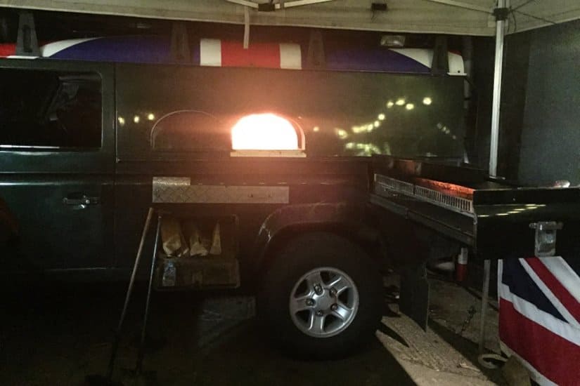 Merial wild west themed event with wood-burning oven fitted into a Land Rover